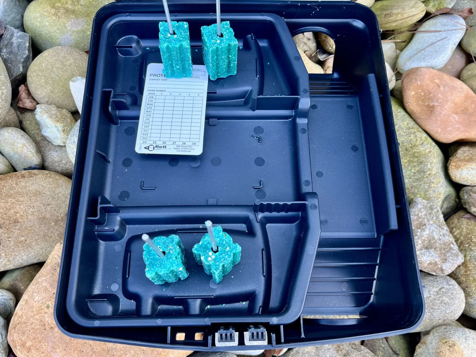 the inside of a rodent bait box